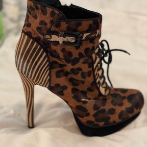 Sam Edelman heeled boots. Fun Animal print and striped heel.